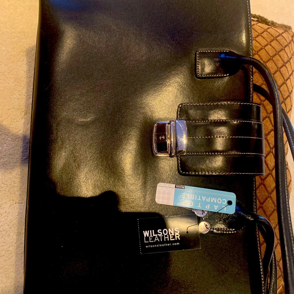 Laptop briefcase. New never used. Has lock for privacy. Black in color.